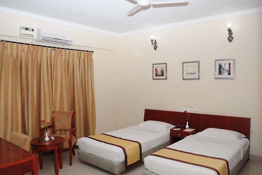 Ivory Inn Bangalore Zimmer foto